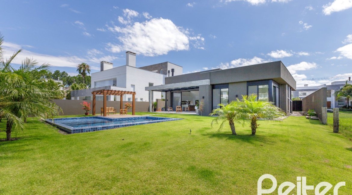 Casa em Condomínio à venda com 370m², 3 dormitórios, 3 suítes, 4 vagas, no bairro Terra Ville em PORTO ALEGRE