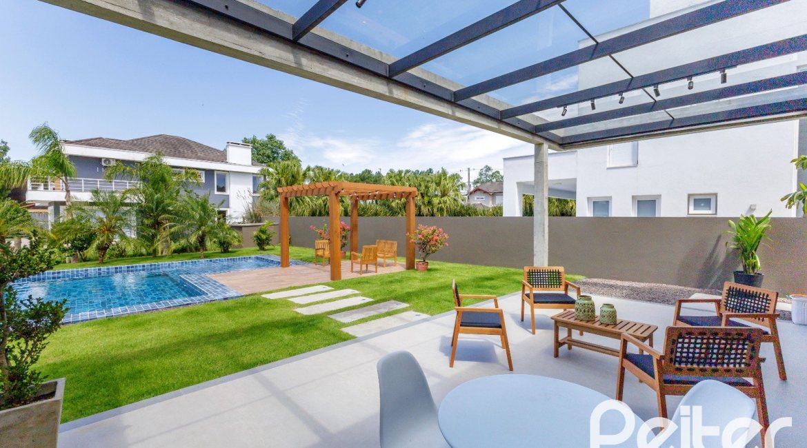 Casa em Condomínio à venda com 370m², 3 dormitórios, 3 suítes, 4 vagas, no bairro Terra Ville em PORTO ALEGRE