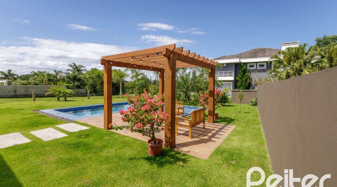 Casa em Condomínio à venda com 370m², 3 dormitórios, 3 suítes, 4 vagas, no bairro Terra Ville em PORTO ALEGRE