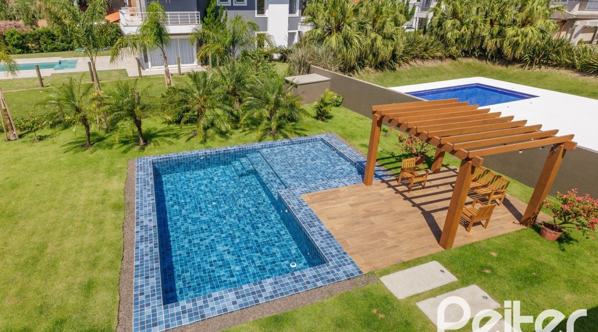 Casa em Condomínio à venda com 370m², 3 dormitórios, 3 suítes, 4 vagas, no bairro Terra Ville em PORTO ALEGRE