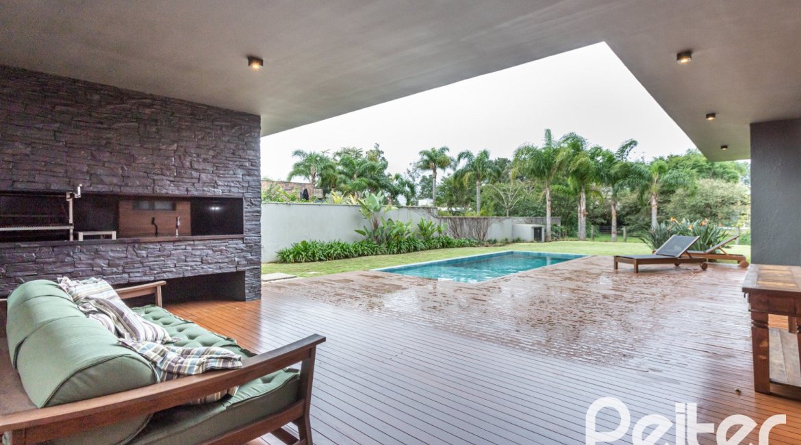 Casa em Condomínio à venda com 327m², 3 dormitórios, 3 suítes, 4 vagas, no bairro Terra Ville em PORTO ALEGRE