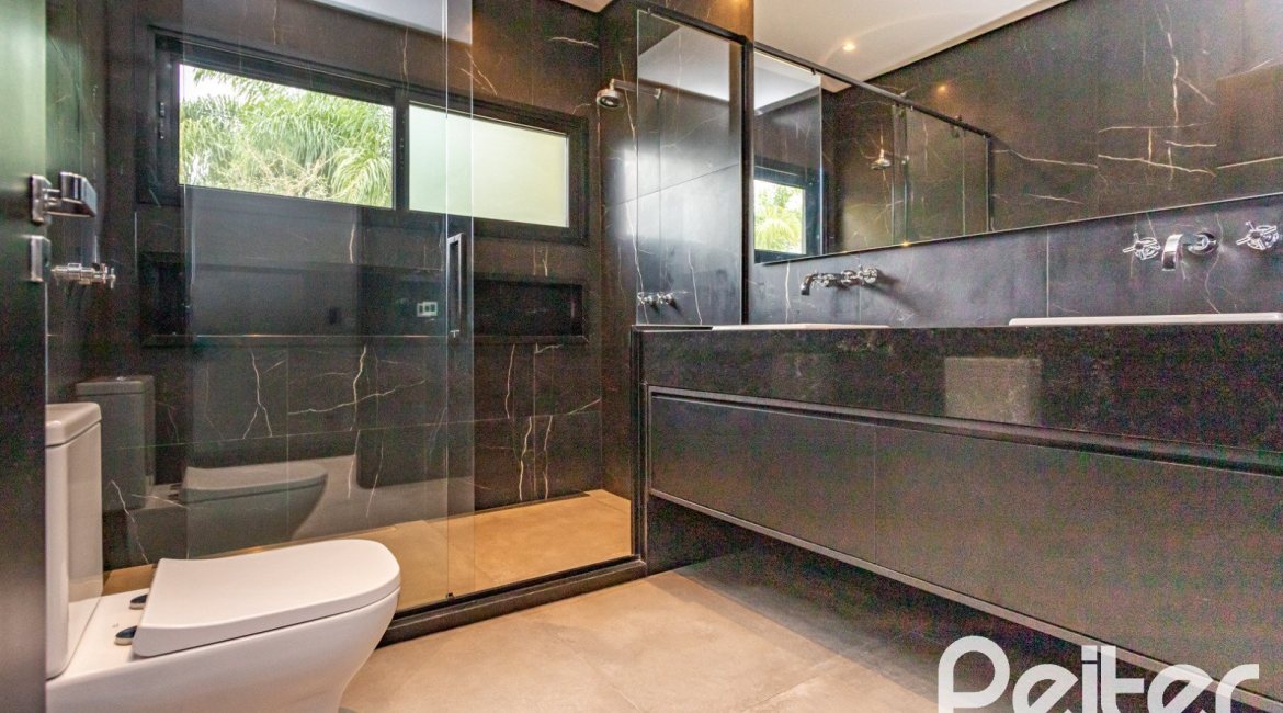 Casa em Condomínio à venda com 327m², 3 dormitórios, 3 suítes, 4 vagas, no bairro Terra Ville em PORTO ALEGRE