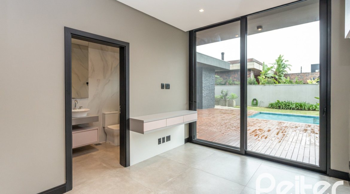 Casa em Condomínio à venda com 327m², 3 dormitórios, 3 suítes, 4 vagas, no bairro Terra Ville em PORTO ALEGRE