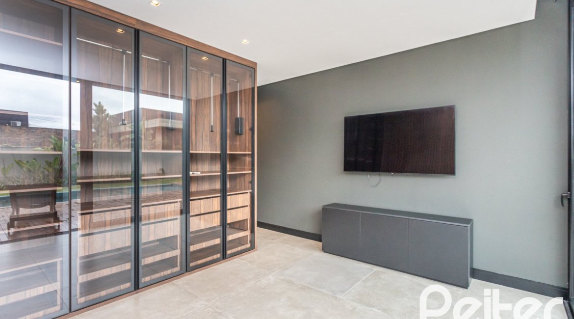 Casa em Condomínio à venda com 327m², 3 dormitórios, 3 suítes, 4 vagas, no bairro Terra Ville em PORTO ALEGRE