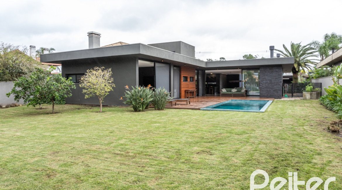 Casa em Condomínio à venda com 327m², 3 dormitórios, 3 suítes, 4 vagas, no bairro Terra Ville em PORTO ALEGRE