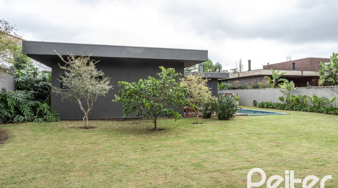 Casa em Condomínio à venda com 327m², 3 dormitórios, 3 suítes, 4 vagas, no bairro Terra Ville em PORTO ALEGRE