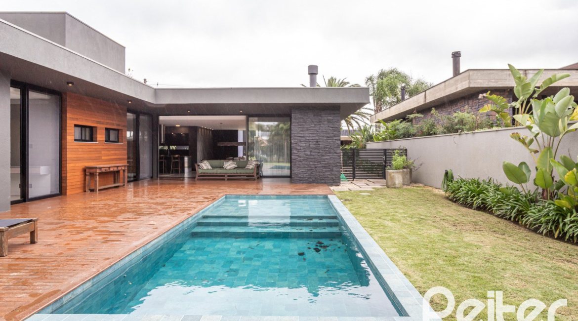 Casa em Condomínio à venda com 327m², 3 dormitórios, 3 suítes, 4 vagas, no bairro Terra Ville em PORTO ALEGRE