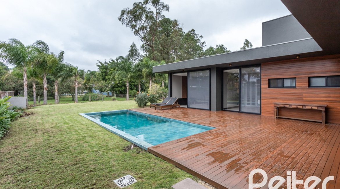 Casa em Condomínio à venda com 327m², 3 dormitórios, 3 suítes, 4 vagas, no bairro Terra Ville em PORTO ALEGRE