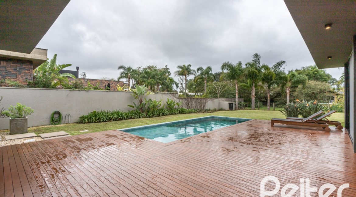 Casa em Condomínio à venda com 327m², 3 dormitórios, 3 suítes, 4 vagas, no bairro Terra Ville em PORTO ALEGRE