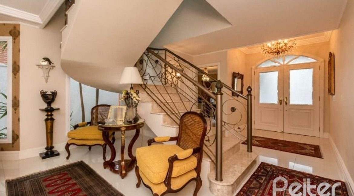 Casa em Condomínio à venda com 338m², 3 dormitórios, 3 suítes, 2 vagas, no bairro Terra Ville em PORTO ALEGRE