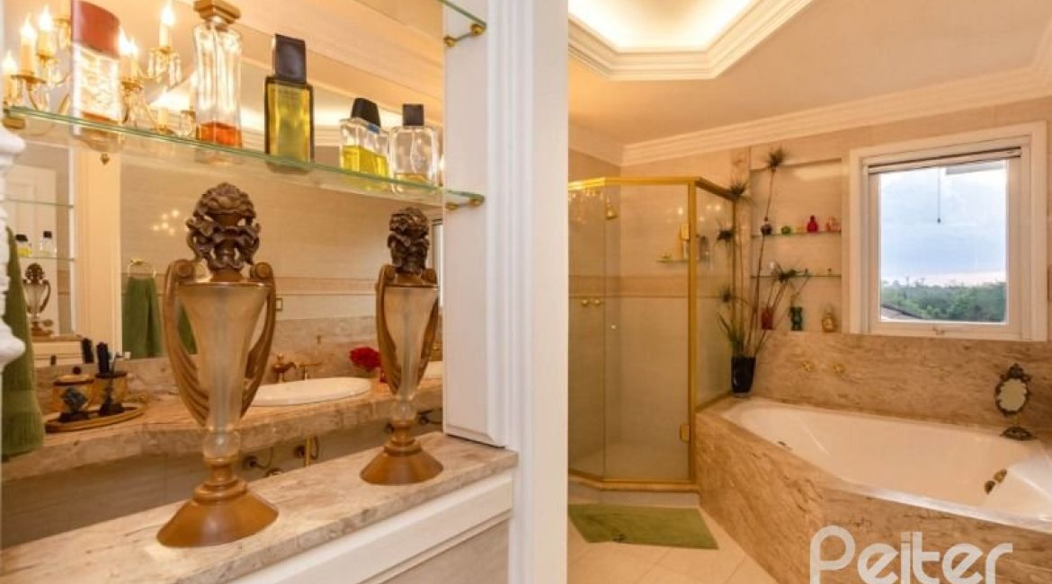 Casa em Condomínio à venda com 338m², 3 dormitórios, 3 suítes, 2 vagas, no bairro Terra Ville em PORTO ALEGRE