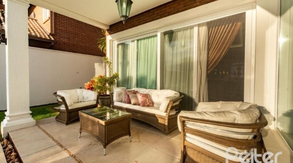 Casa em Condomínio à venda com 338m², 3 dormitórios, 3 suítes, 2 vagas, no bairro Terra Ville em PORTO ALEGRE