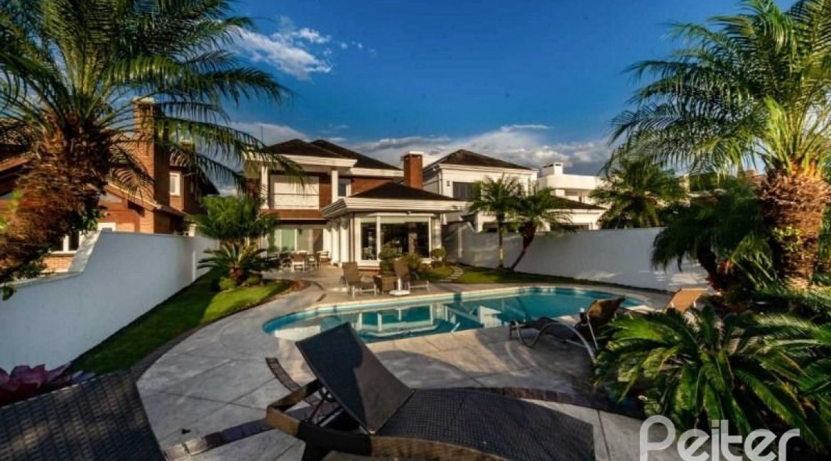 Casa em Condomínio à venda com 338m², 3 dormitórios, 3 suítes, 2 vagas, no bairro Terra Ville em PORTO ALEGRE