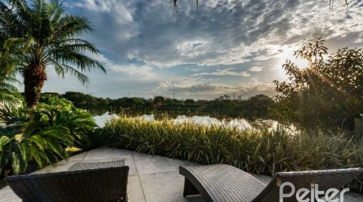 Casa em Condomínio à venda com 338m², 3 dormitórios, 3 suítes, 2 vagas, no bairro Terra Ville em PORTO ALEGRE