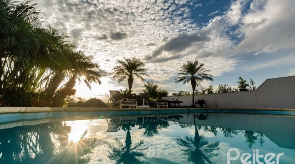 Casa em Condomínio à venda com 338m², 3 dormitórios, 3 suítes, 2 vagas, no bairro Terra Ville em PORTO ALEGRE