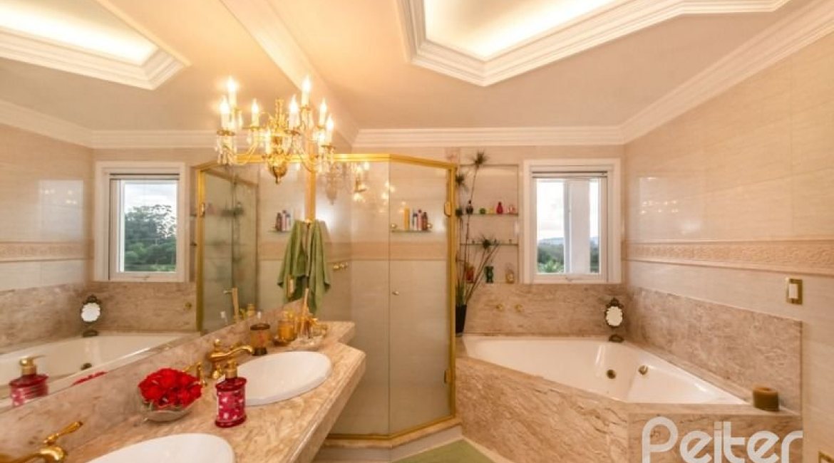 Casa em Condomínio à venda com 338m², 3 dormitórios, 3 suítes, 2 vagas, no bairro Terra Ville em PORTO ALEGRE