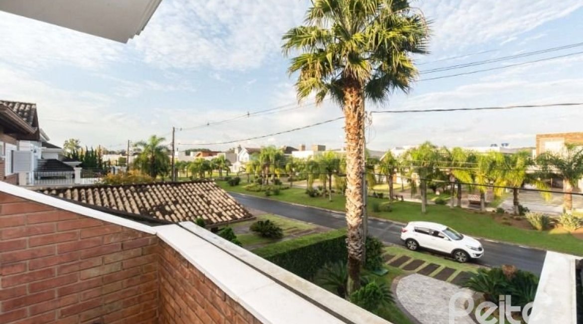 Casa em Condomínio à venda com 338m², 3 dormitórios, 3 suítes, 2 vagas, no bairro Terra Ville em PORTO ALEGRE