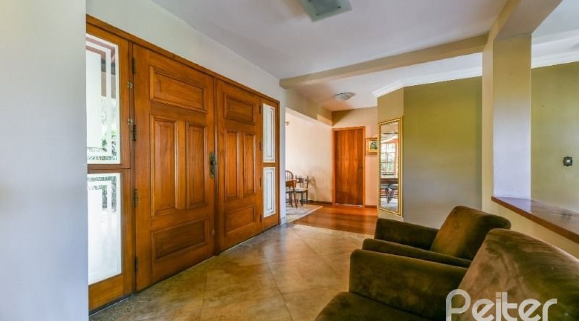 Casa em Condomínio à venda com 320m², 4 dormitórios, 4 suítes, 10 vagas, no bairro Cavalhada em PORTO ALEGRE