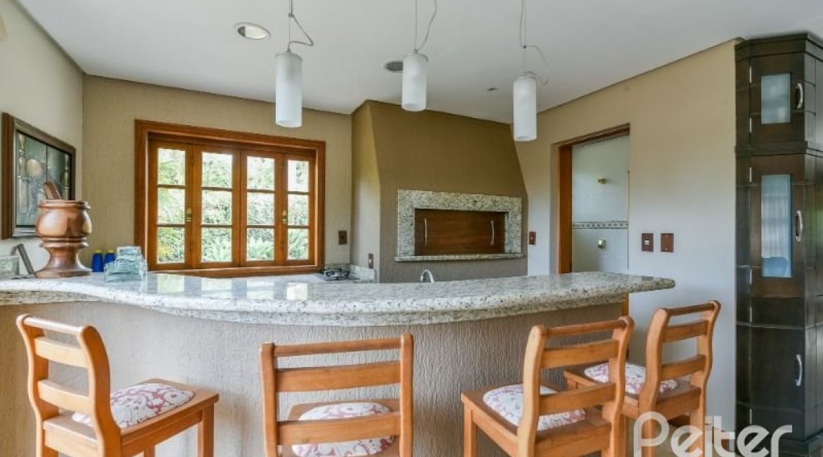 Casa em Condomínio à venda com 320m², 4 dormitórios, 4 suítes, 10 vagas, no bairro Cavalhada em PORTO ALEGRE