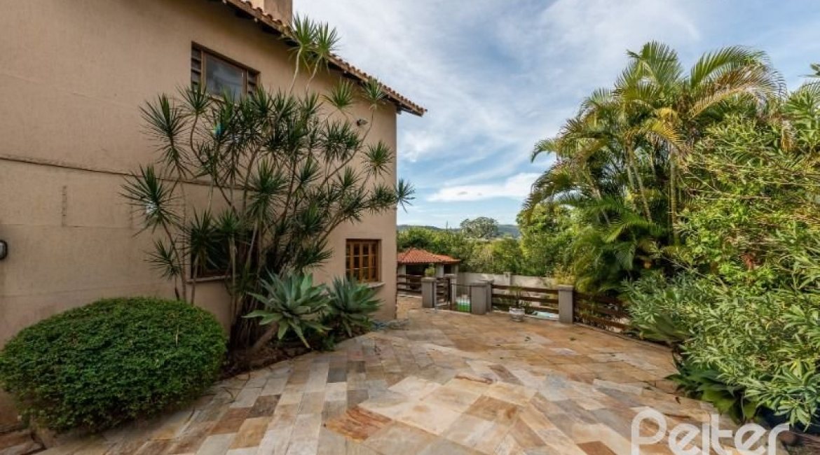 Casa em Condomínio à venda com 320m², 4 dormitórios, 4 suítes, 10 vagas, no bairro Cavalhada em PORTO ALEGRE