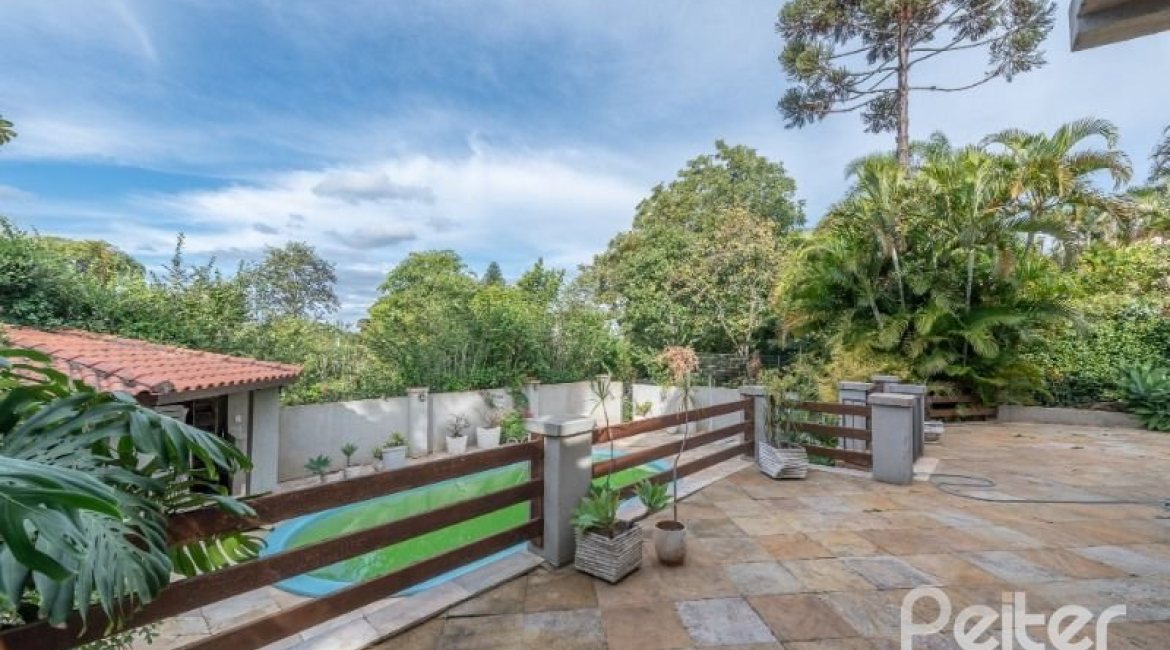 Casa em Condomínio à venda com 320m², 4 dormitórios, 4 suítes, 10 vagas, no bairro Cavalhada em PORTO ALEGRE