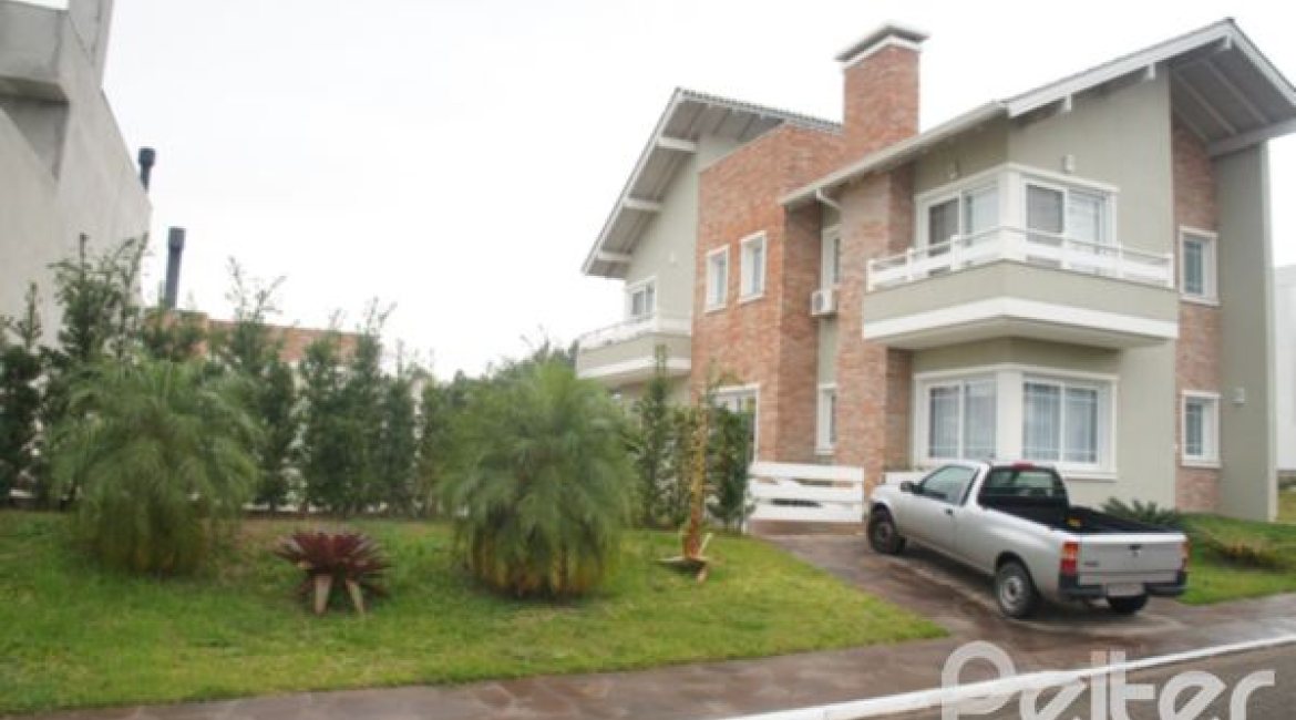 Casa em Condomínio à venda com 263m², 3 dormitórios, 1 suíte, 3 vagas, no bairro Mountain Ville em PORTO ALEGRE