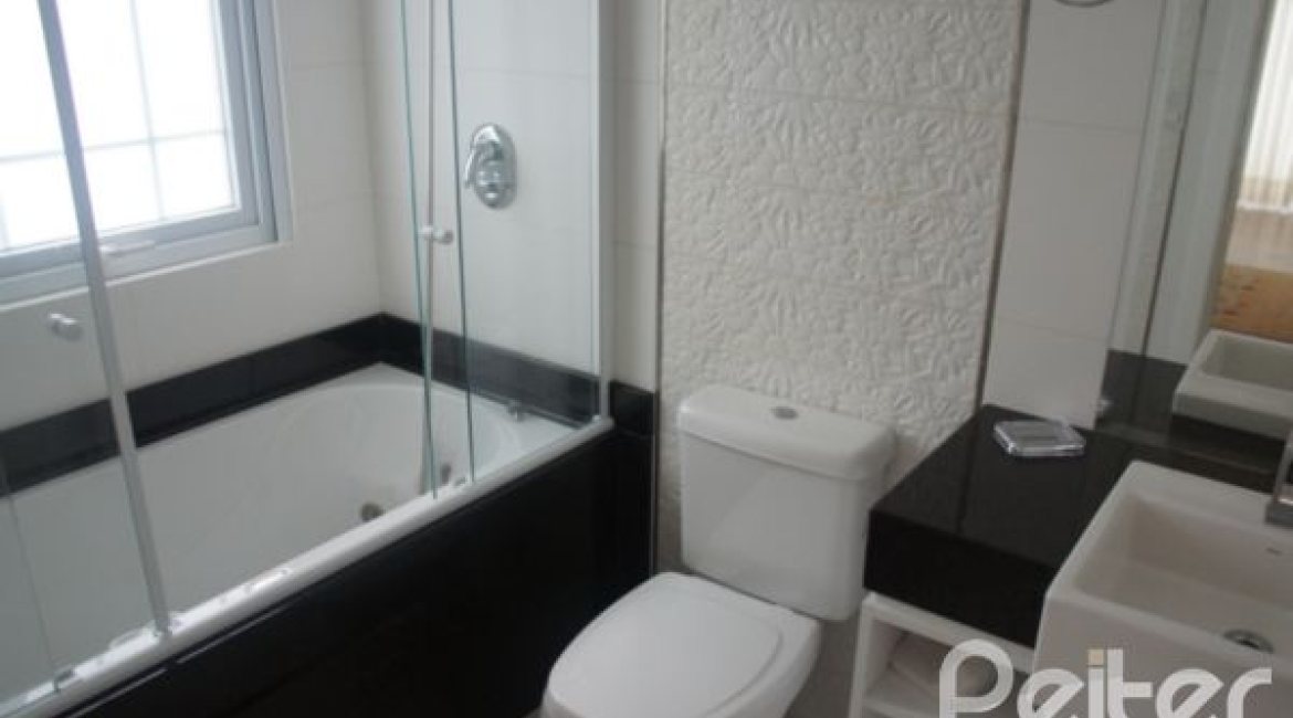 Casa em Condomínio à venda com 263m², 3 dormitórios, 1 suíte, 3 vagas, no bairro Mountain Ville em PORTO ALEGRE