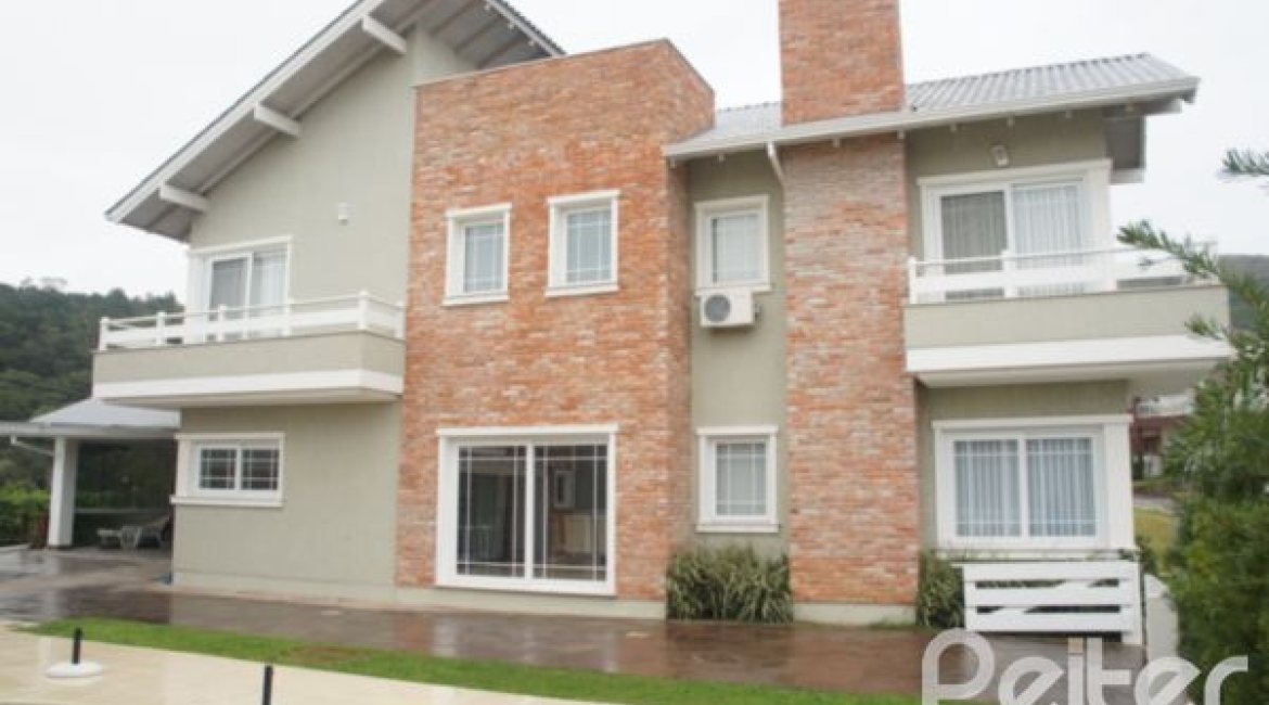 Casa em Condomínio à venda com 263m², 3 dormitórios, 1 suíte, 3 vagas, no bairro Mountain Ville em PORTO ALEGRE