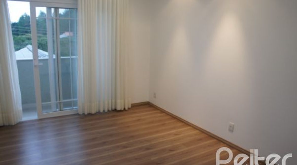 Casa em Condomínio à venda com 263m², 3 dormitórios, 1 suíte, 3 vagas, no bairro Mountain Ville em PORTO ALEGRE