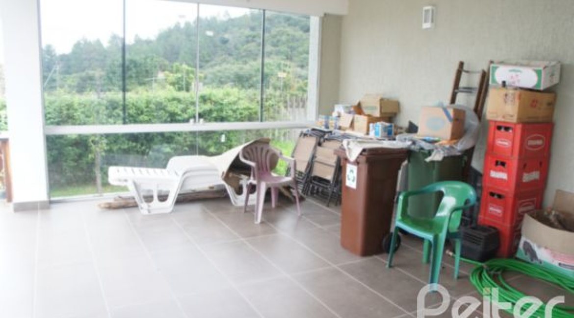 Casa em Condomínio à venda com 263m², 3 dormitórios, 1 suíte, 3 vagas, no bairro Mountain Ville em PORTO ALEGRE