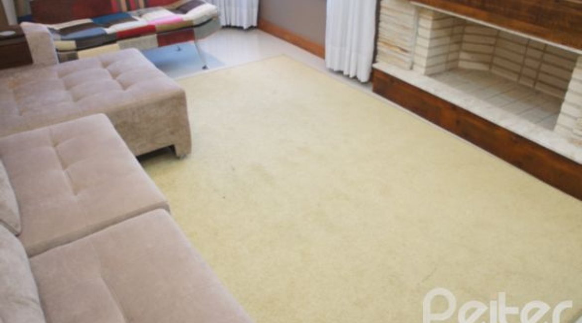 Casa em Condomínio à venda com 263m², 3 dormitórios, 1 suíte, 3 vagas, no bairro Mountain Ville em PORTO ALEGRE