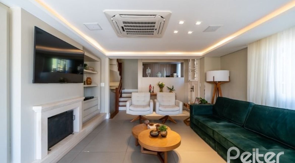 Casa em Condomínio à venda com 210m², 3 dormitórios, 2 suítes, 4 vagas, no bairro Jardim Isabel em Porto Alegre