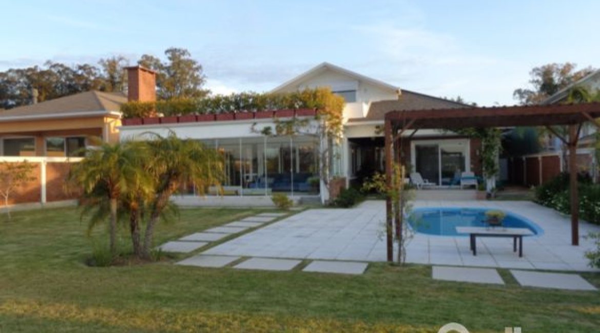 Casa em Condomínio à venda com 392m², 3 dormitórios, 1 suíte, 2 vagas, no bairro Terra Ville em Porto Alegre