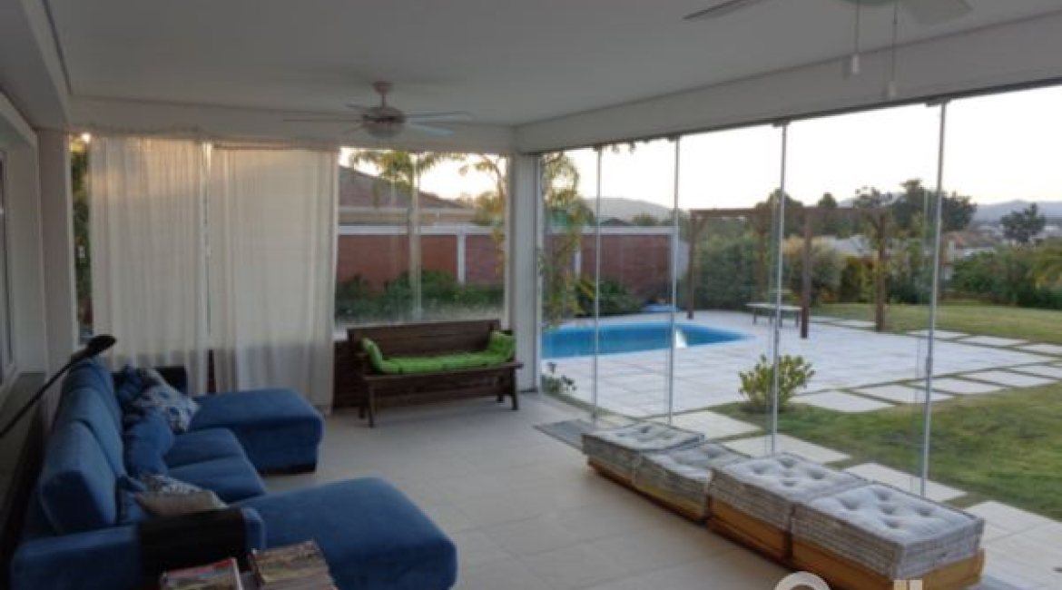 Casa em Condomínio à venda com 392m², 3 dormitórios, 1 suíte, 2 vagas, no bairro Terra Ville em Porto Alegre