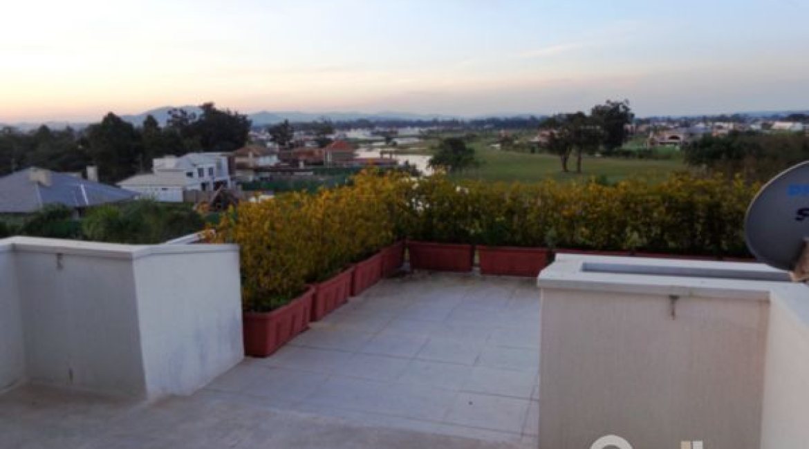 Casa em Condomínio à venda com 392m², 3 dormitórios, 1 suíte, 2 vagas, no bairro Terra Ville em Porto Alegre