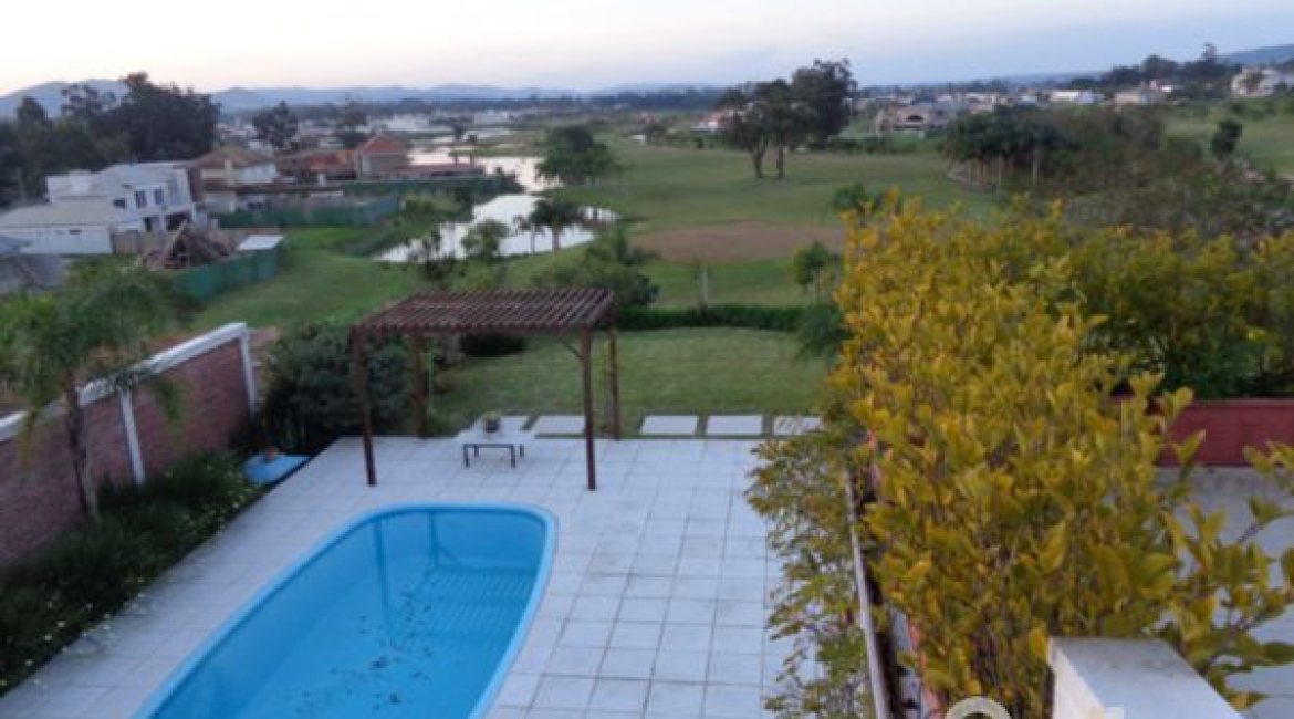 Casa em Condomínio à venda com 392m², 3 dormitórios, 1 suíte, 2 vagas, no bairro Terra Ville em Porto Alegre