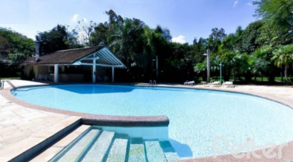 Casa em Condomínio à venda com 392m², 3 dormitórios, 1 suíte, 2 vagas, no bairro Terra Ville em Porto Alegre