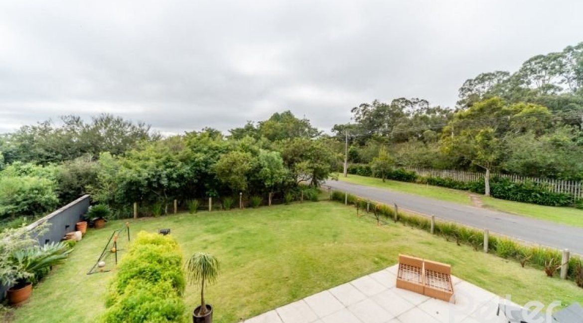 Casa em Condomínio à venda com 560m², 5 dormitórios, 5 suítes, 4 vagas, no bairro Terra Ville em PORTO ALEGRE