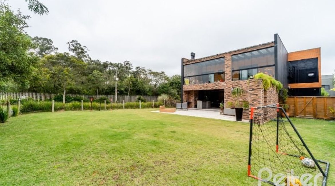 Casa em Condomínio à venda com 560m², 5 dormitórios, 5 suítes, 4 vagas, no bairro Terra Ville em PORTO ALEGRE