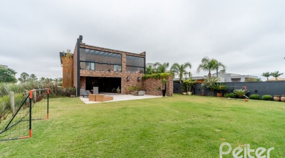 Casa em Condomínio à venda com 560m², 5 dormitórios, 5 suítes, 4 vagas, no bairro Terra Ville em PORTO ALEGRE
