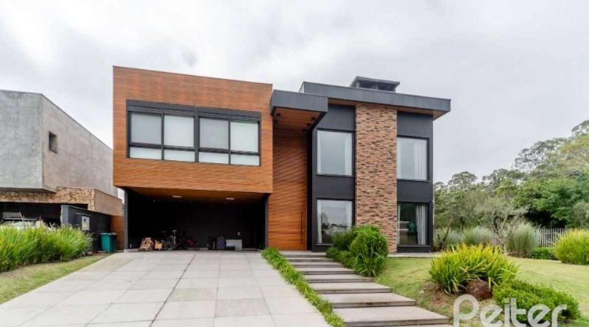 Casa em Condomínio à venda com 560m², 5 dormitórios, 5 suítes, 4 vagas, no bairro Terra Ville em PORTO ALEGRE
