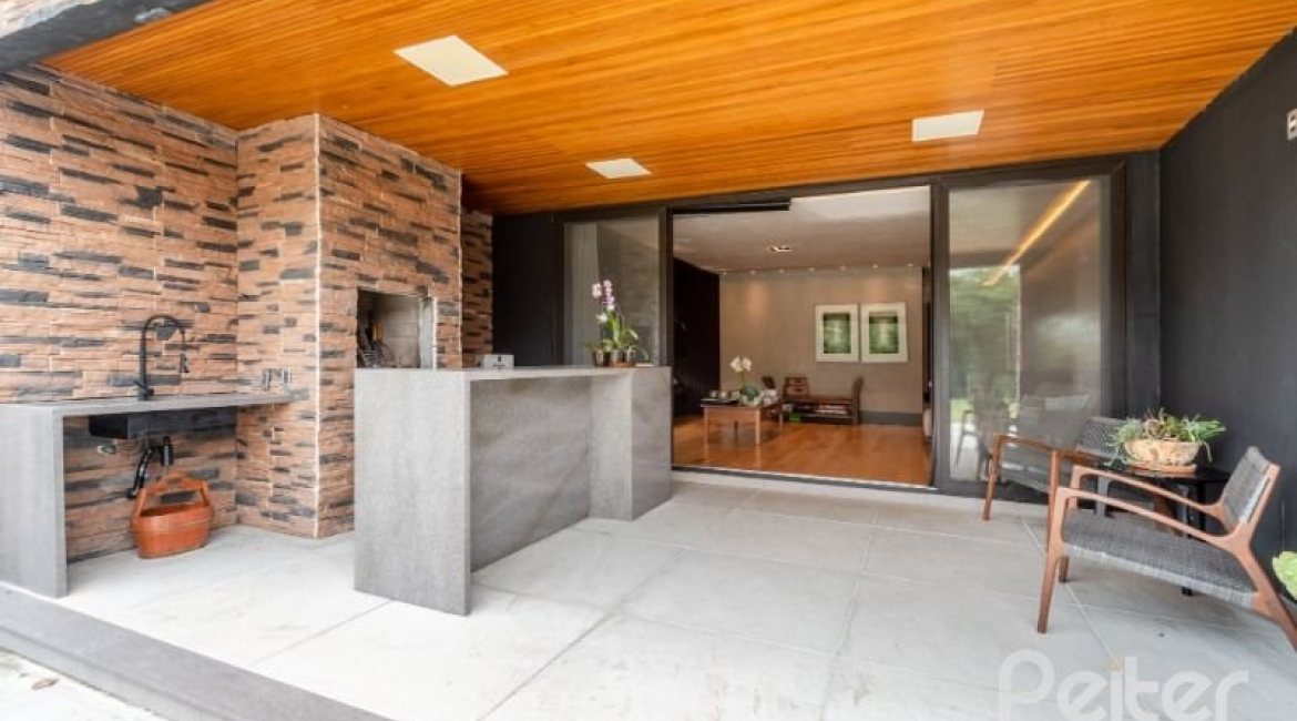 Casa em Condomínio à venda com 560m², 5 dormitórios, 5 suítes, 4 vagas, no bairro Terra Ville em PORTO ALEGRE