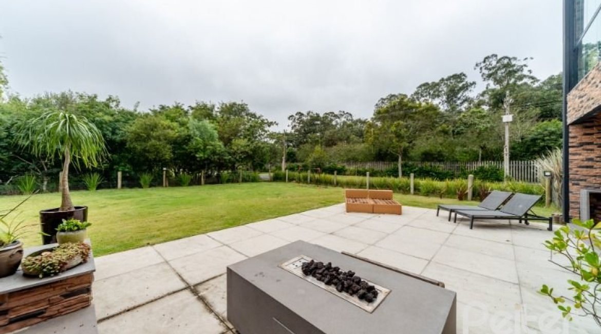 Casa em Condomínio à venda com 560m², 5 dormitórios, 5 suítes, 4 vagas, no bairro Terra Ville em PORTO ALEGRE