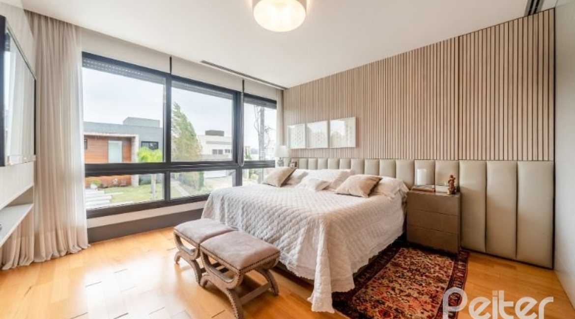 Casa em Condomínio à venda com 560m², 5 dormitórios, 5 suítes, 4 vagas, no bairro Terra Ville em PORTO ALEGRE