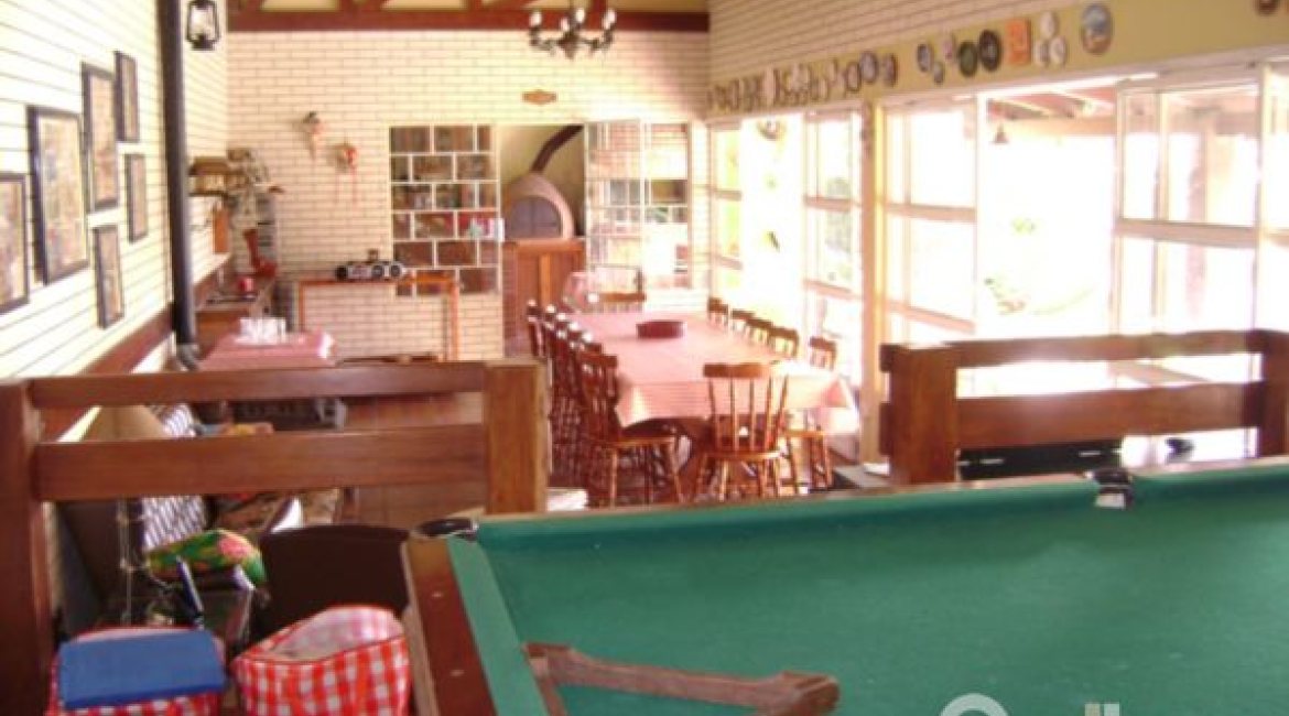 Casa à venda com 500m², 4 dormitórios, 3 suítes, 4 vagas, no bairro Tristeza em Porto Alegre