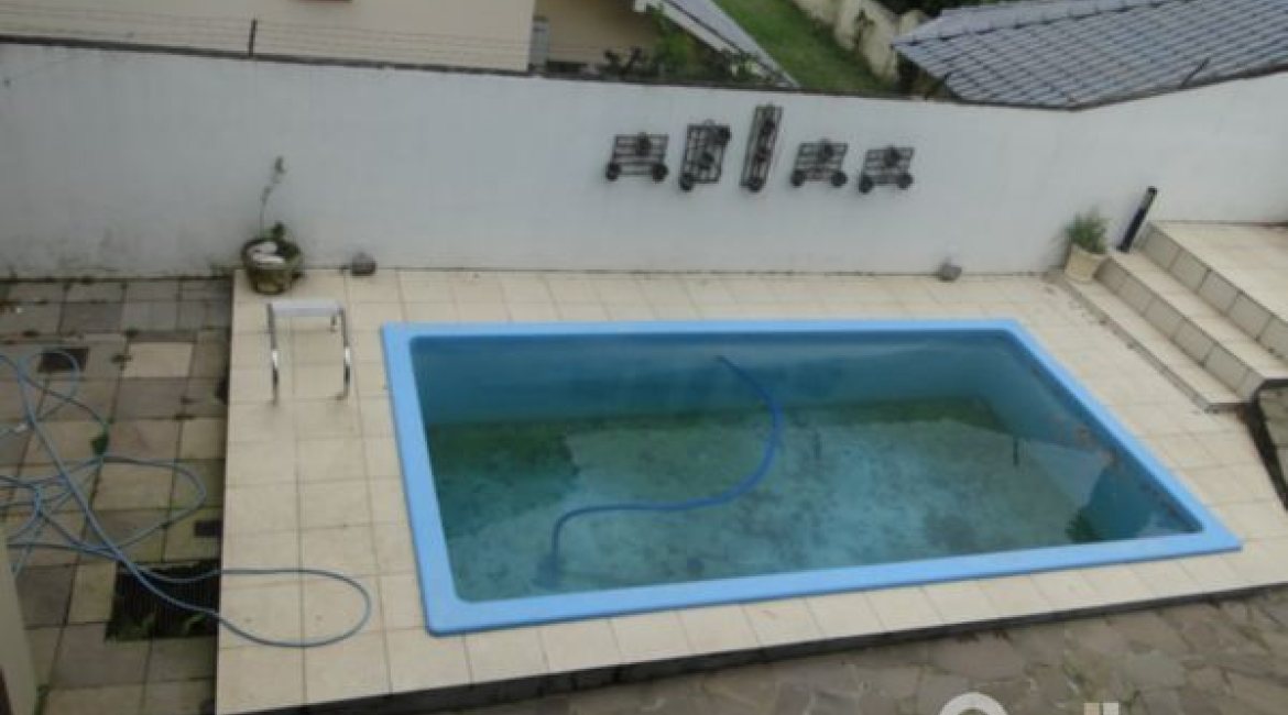 Casa em Condomínio à venda com 236m², 4 dormitórios, 1 suíte, 3 vagas, no bairro Espírito Santo em Porto Alegre