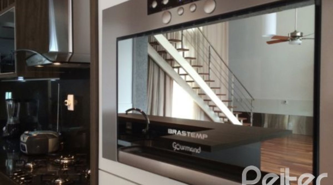 Casa em Condomínio à venda com 258m², 2 dormitórios, 2 suítes, 3 vagas, no bairro Hípica em Porto Alegre