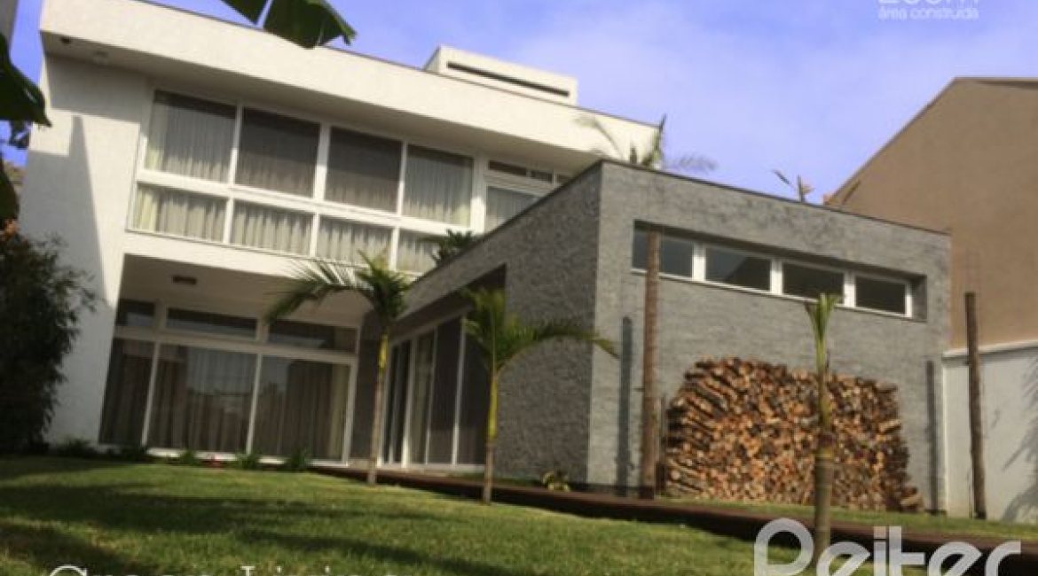 Casa em Condomínio à venda com 258m², 2 dormitórios, 2 suítes, 3 vagas, no bairro Hípica em Porto Alegre