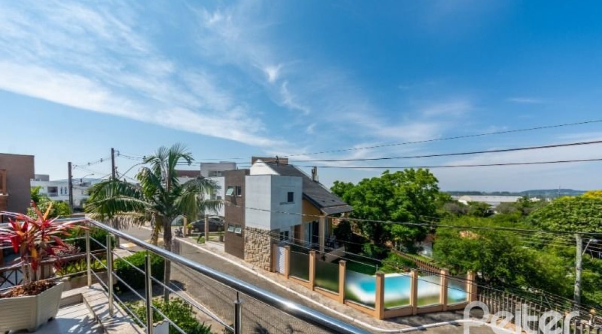 Casa em Condomínio à venda com 234m², 3 dormitórios, 3 suítes, 3 vagas, no bairro Hípica em Porto Alegre