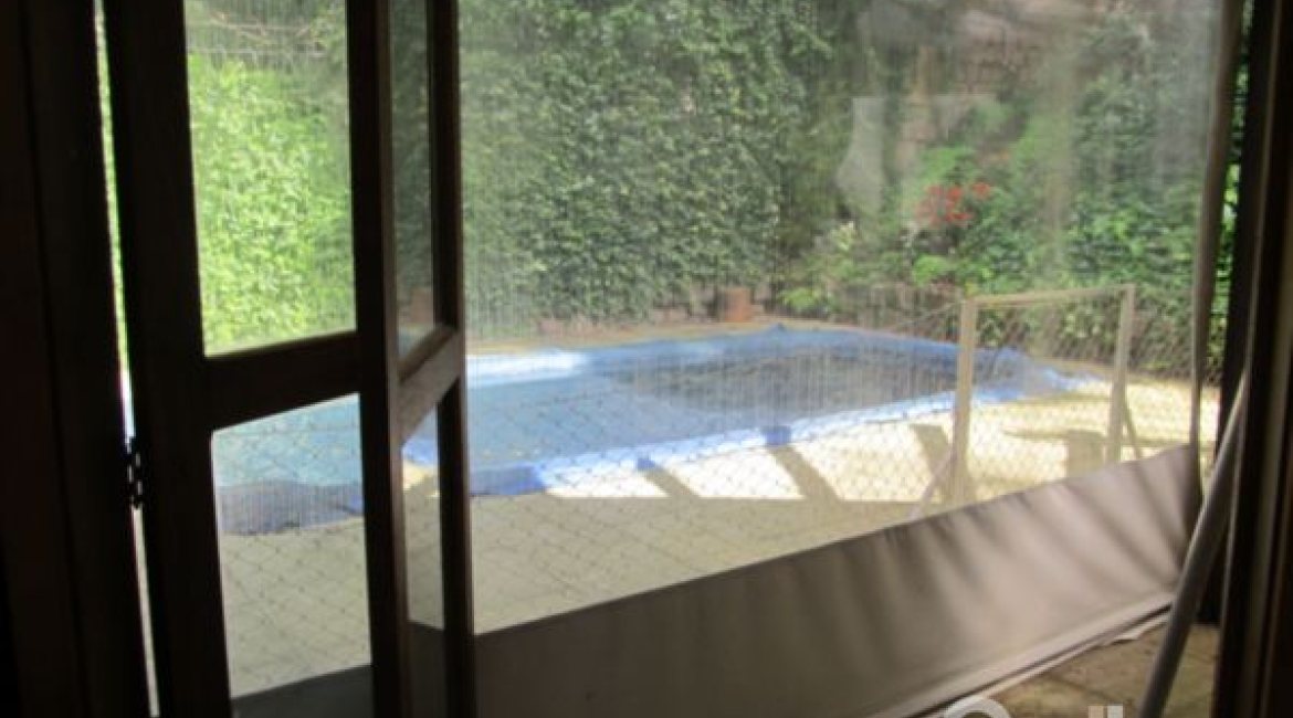 Casa à venda com 600m², 7 dormitórios, 3 suítes, 3 vagas, no bairro Espírito Santo em Porto Alegre